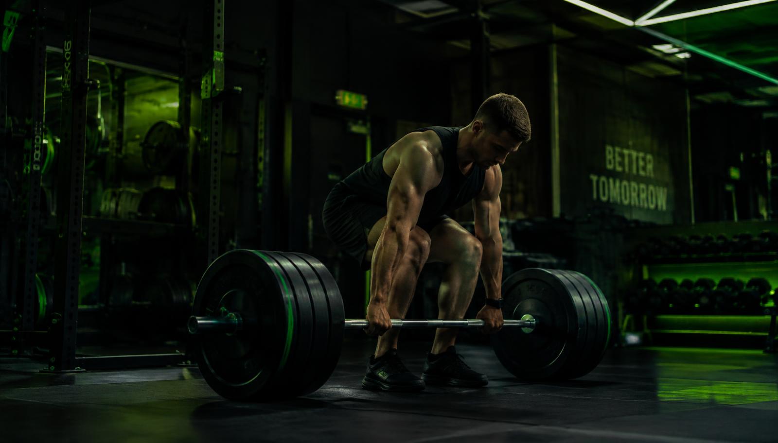 Athlete lifting a barbell at URBN Gym